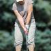 Carlene Laskey, of Saline, putts during the Judy Fike Annual Golf Outing "Tee it Up to Make a Difference for Ann Arbor Meals on Wheels!" on Monday morning. Melanie Maxwell I AnnArbor.com